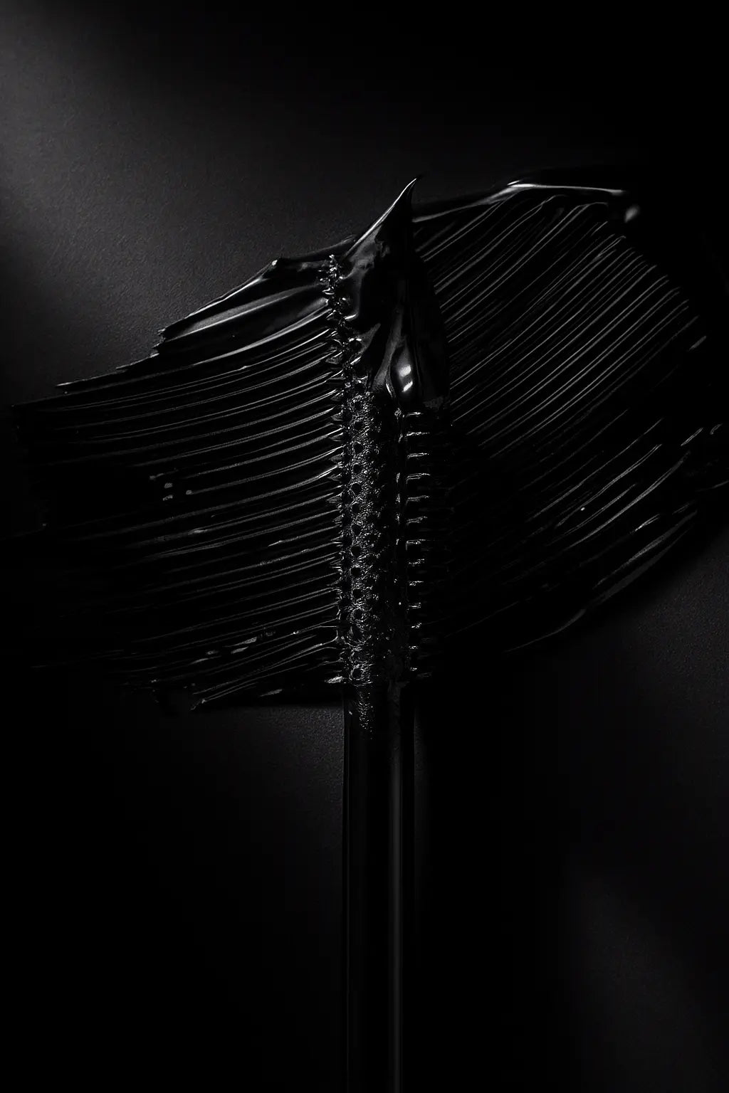 Black tubing mascara wraps around each eyelash. so no clumps