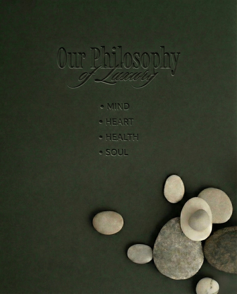 Dark green book cover with 'Our Philosophy of Luxury' text and stones on a dark background
Natural ingredients cosmetics