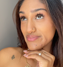 girl with long dramatic lashes with mascara applied and lash lift