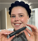 happy customer with mascara purchase 